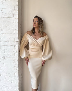 beige off shoulder satin dress with long sleeves