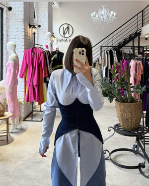 store interior with dresses and plants