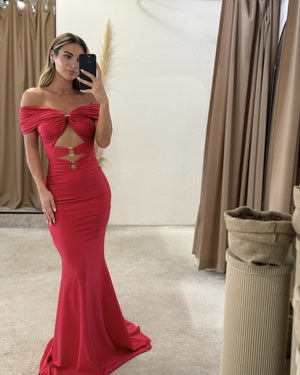 woman in red cutout off shoulder dress in fitting room