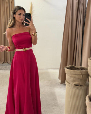 woman in red sleeveless maxi dress in fitting room