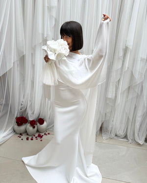 elegant white dress with flower bouquet