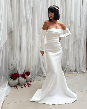 elegant off shoulder white dress with long gloves