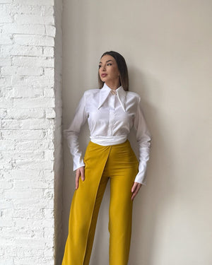 women s white blouse and yellow trousers outfit