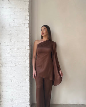 one shoulder brown dress with draped sleeve